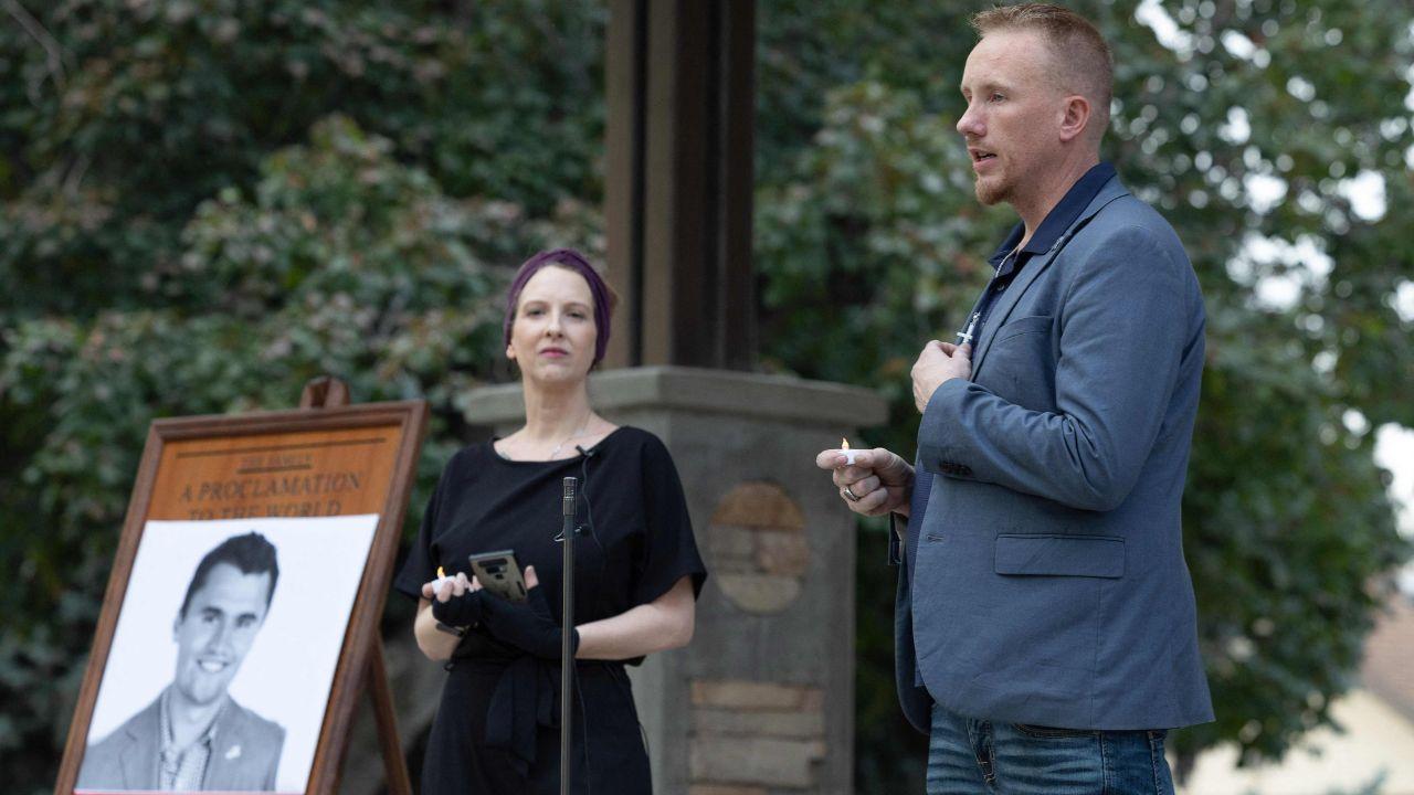 Organizers Jacob Oaks, director of Liberty United, and Cami Jensen speak at a vigil for youth activist and influencer Charlie Kirk